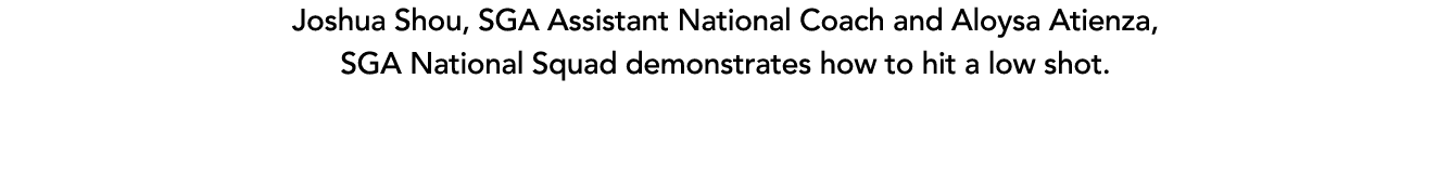 Joshua Shou, SGA Assistant National Coach and Aloysa Atienza, SGA National Squad demonstrates how to hit a low shot.