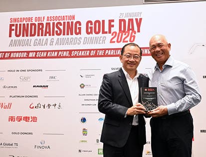 Two men are holding up an award, one of them is wearing a suit. AI generated content