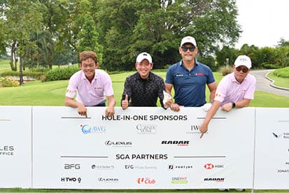 Four men pose with a banner for sponsors. AI generated content