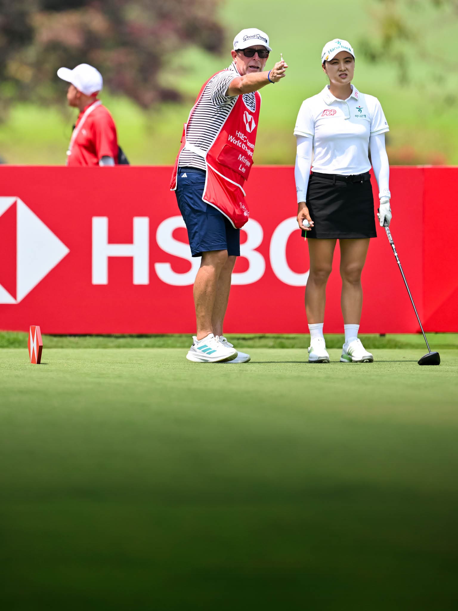 Two people are playing golf on a course. AI generated content